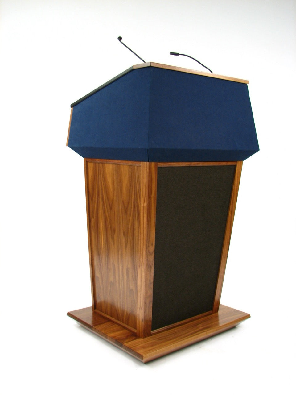 wooden podium with mic and speakers