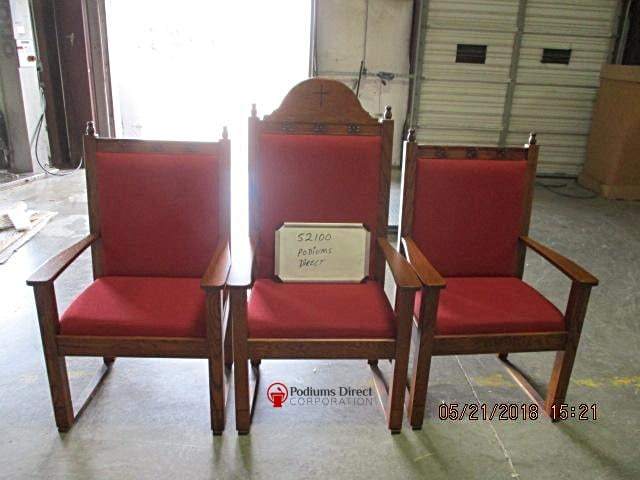 NO 200 rosette carved clergy chair: set of three, front view, center chair with the optional crown back, red fabric