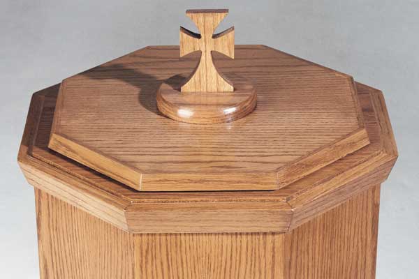 Close view of the NO 400 baptismal font cover and carved wood cross