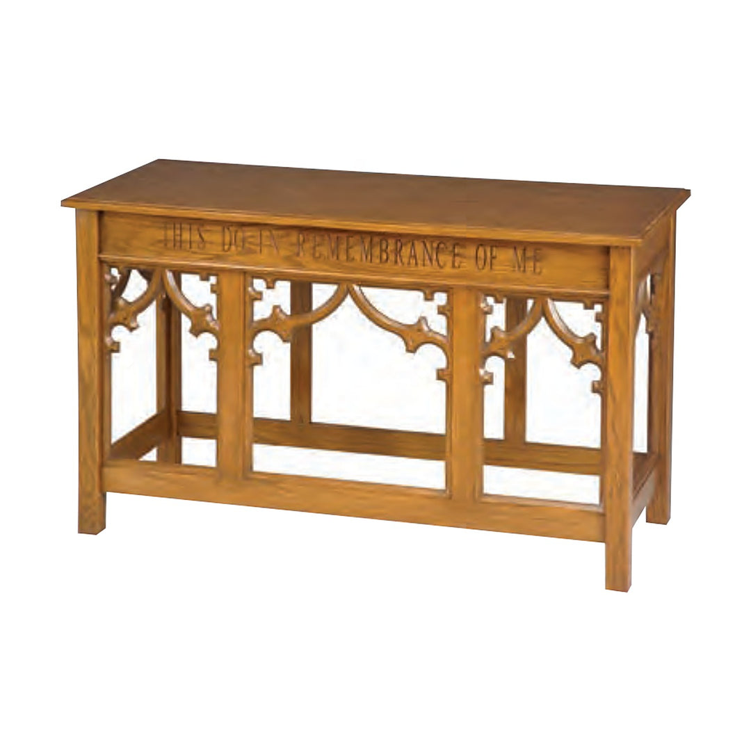 NO 205 open communion table in solid red oak with Gothic tracery and carved inscription