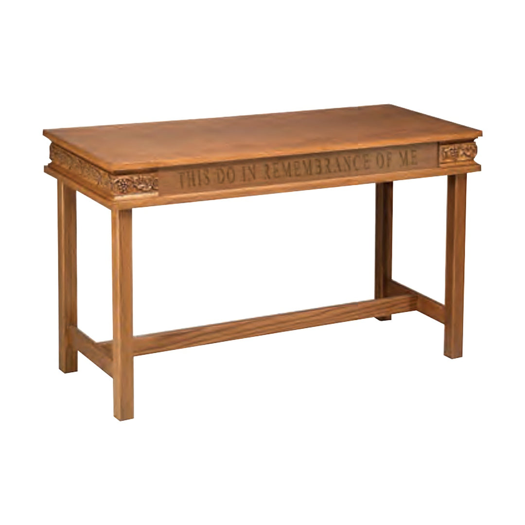 NO 505 open communion table in solid red oak with carved grapevine trim and inscription