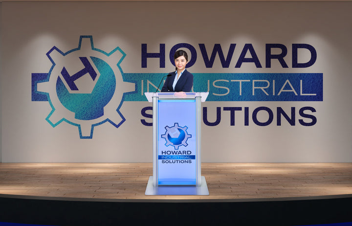 LED Illuminated Acrylic and Aluminum Podium with custom logo, on stage at a company event