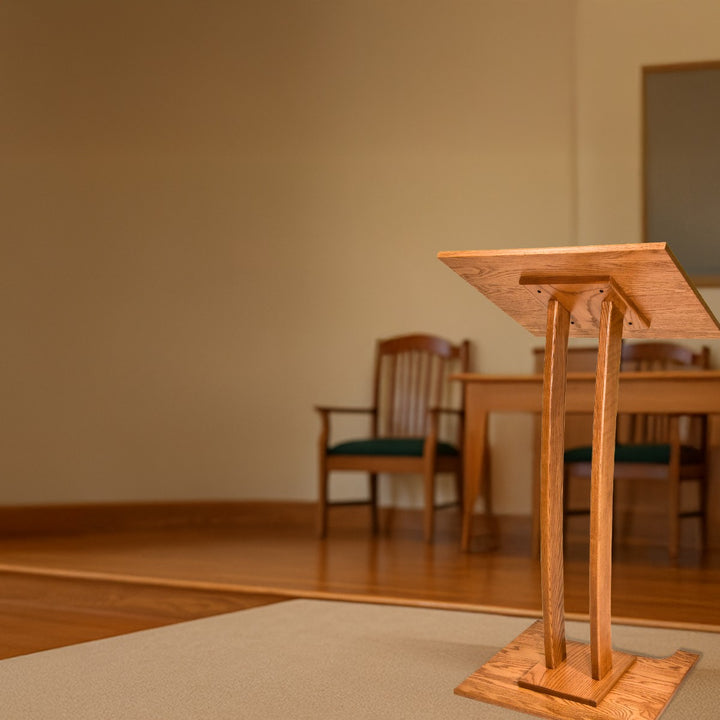 Handcrafted Solid Oak Lectern, Golden Honey Finish, Made in USA, in a meeting room