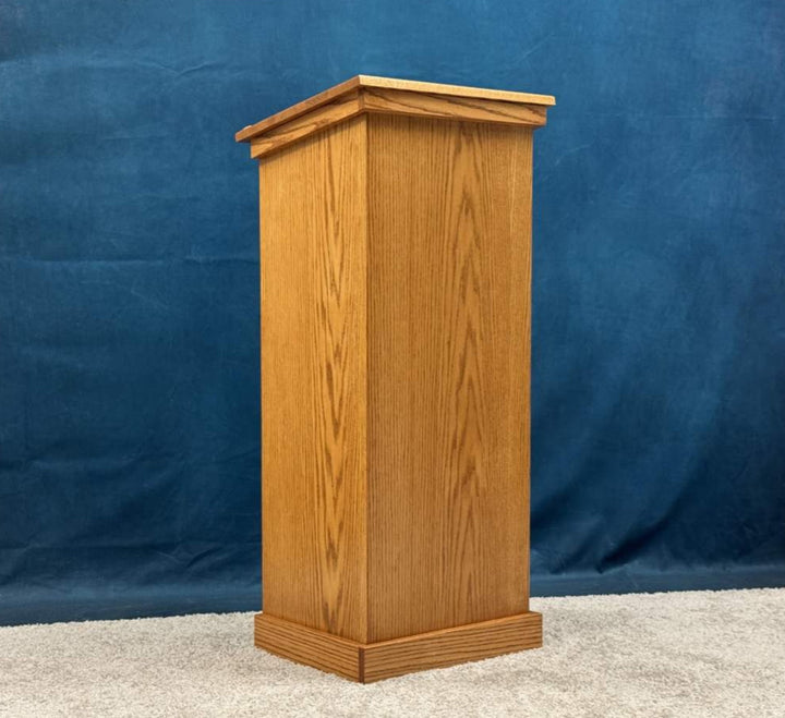 Portable oak podium in oak with early American stain